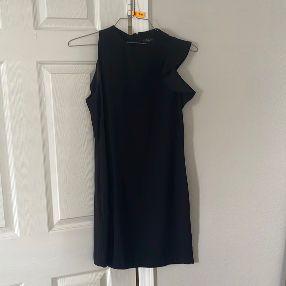 Black shift dress with one side ruffle
